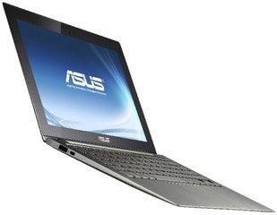 asus UX21 : 1,1Kg sur la balance et 3mm dépaisseur sur son extrémité [cliquer pour agrandir]